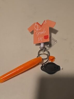 Peach 'Scrub Life' Nurse Badge Reel with Orange Pen